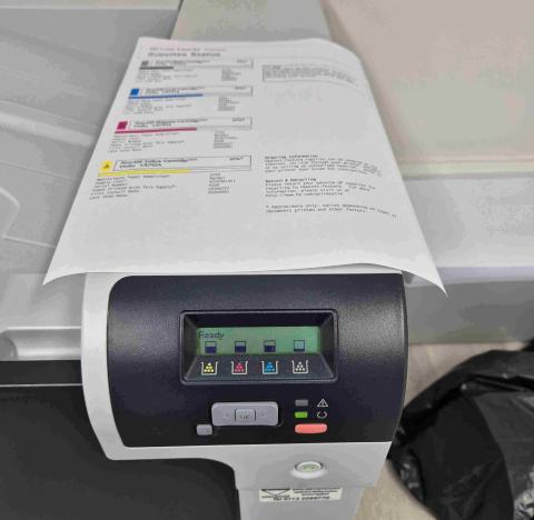 HP Color LaserJet CP5225 professional A3 printer in an office setting.